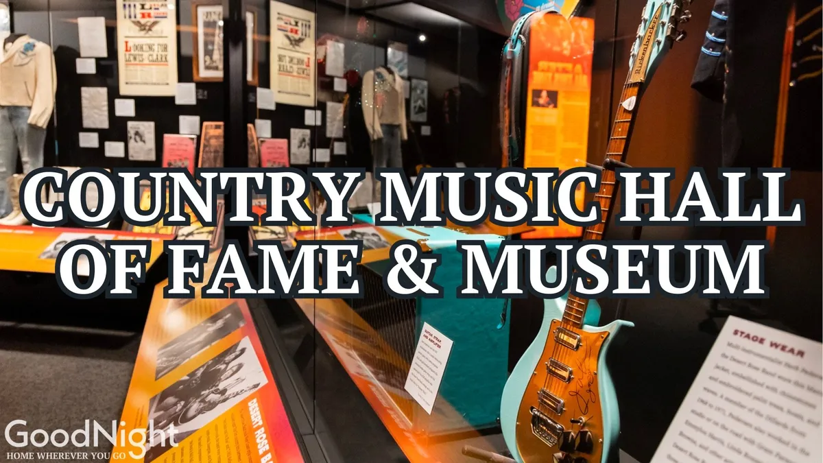 An atmospheric interior setting featuring a guitar, stage wear displays, historical country music posters, and exhibition showcases. The mood is inspiring and reflective, providing a glimpse into the deep roots of Nashville’s music history through thoughtfully curated memorabilia and engaging exhibits.