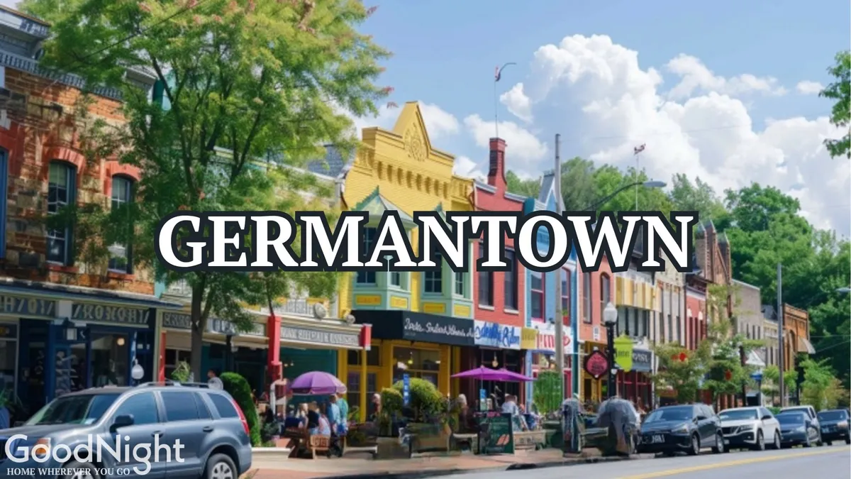 A lively streetscape featuring colorful storefronts, people dining at outdoor tables, and green trees. The scene reflects vibrant street life and a diverse mix of dining, shopping, and social opportunities in downtown Nashville.